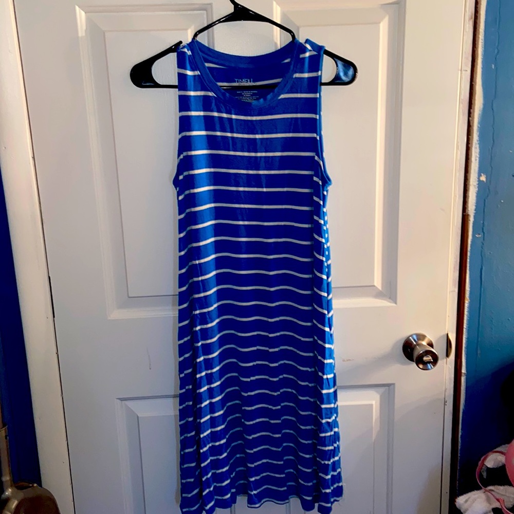 Medium Size Light Blue white stripes Dress. It comes with pockets on both sides